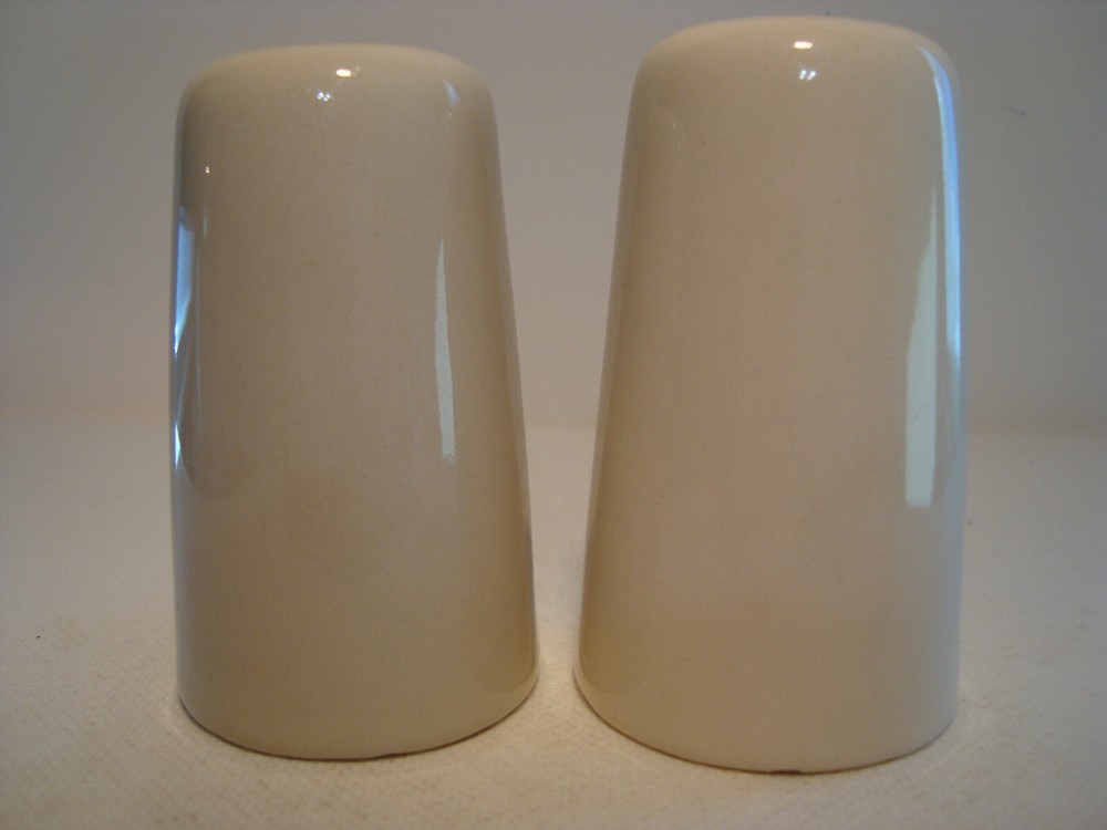 Cone shape white porcelain salt & pepper set.