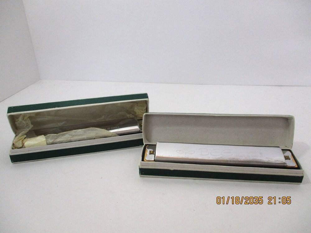 A Set of Two "Bee" Pocket Harmonicas in original boxes.