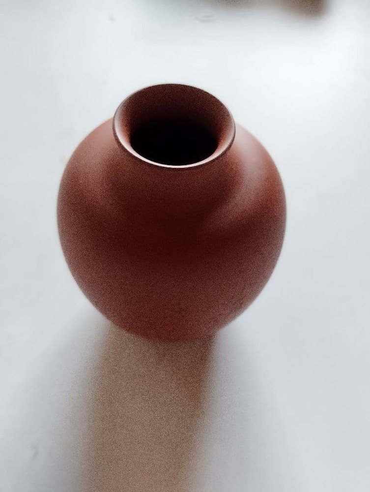 Reddish-brown ceramic sake bottle and 4-piece choko set