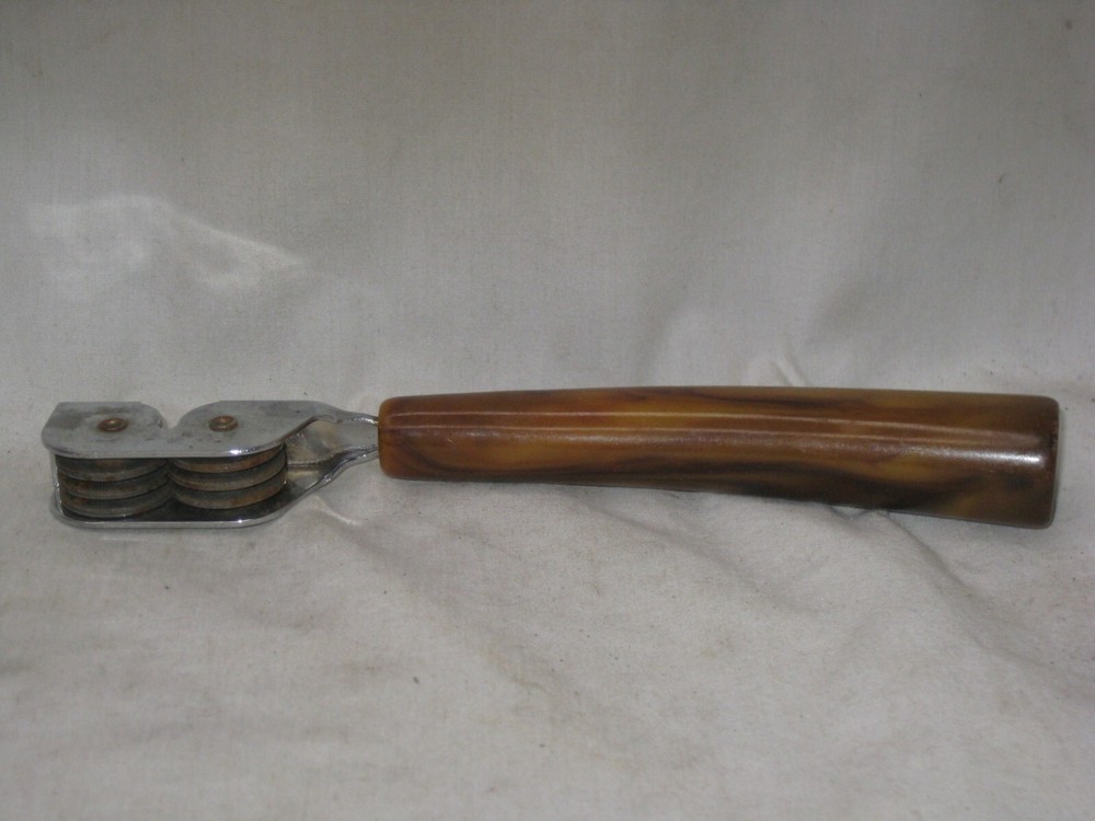 vintage marblized Bakelite handle knife sharpener sharpening utensil