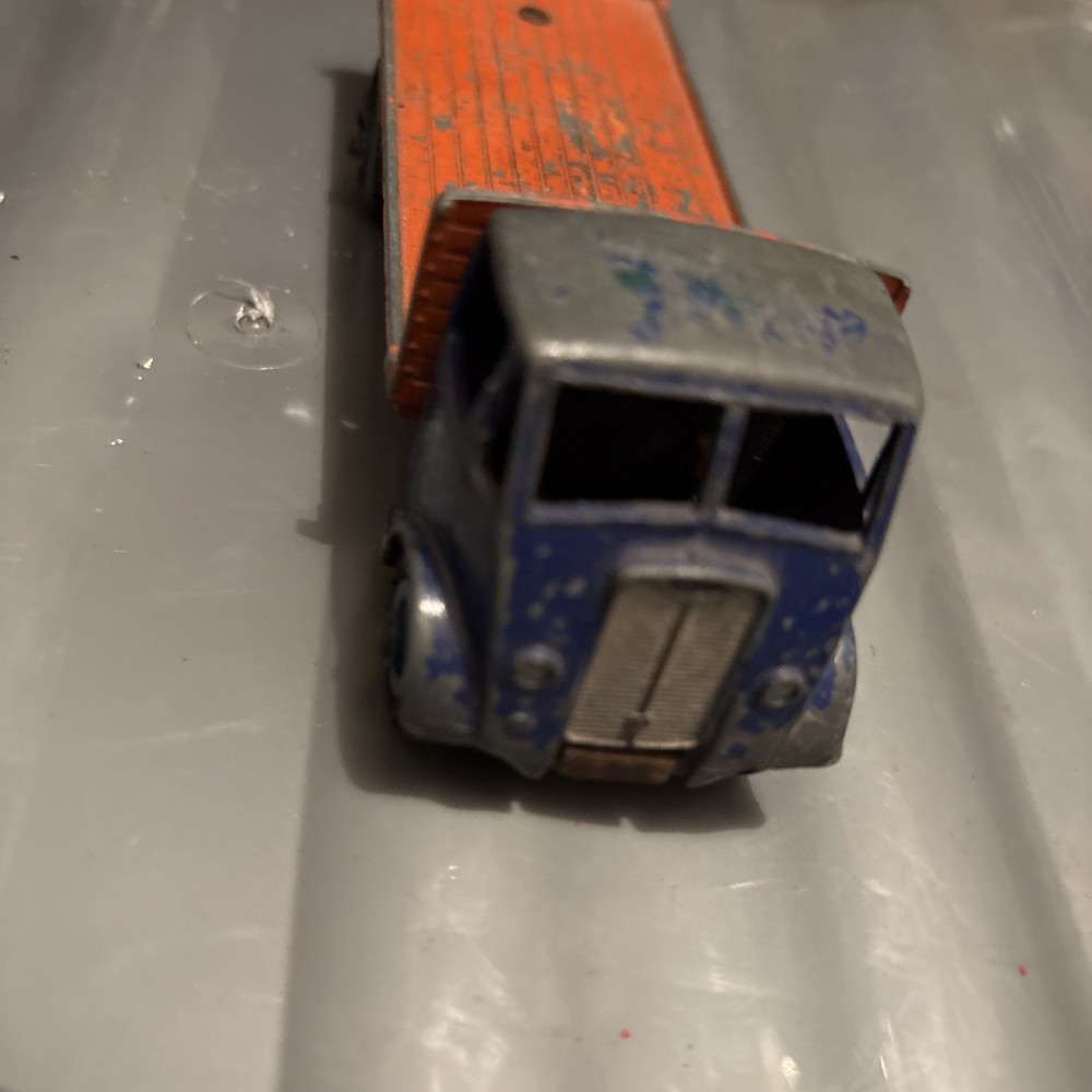 DINKY GUY FLATBED with tailboard 1950s. orange & blue
