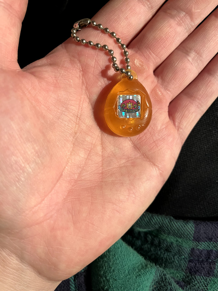 Vintage Bandai Tamagotchi Egg Mini Figure Zip Pull White Orange 2x