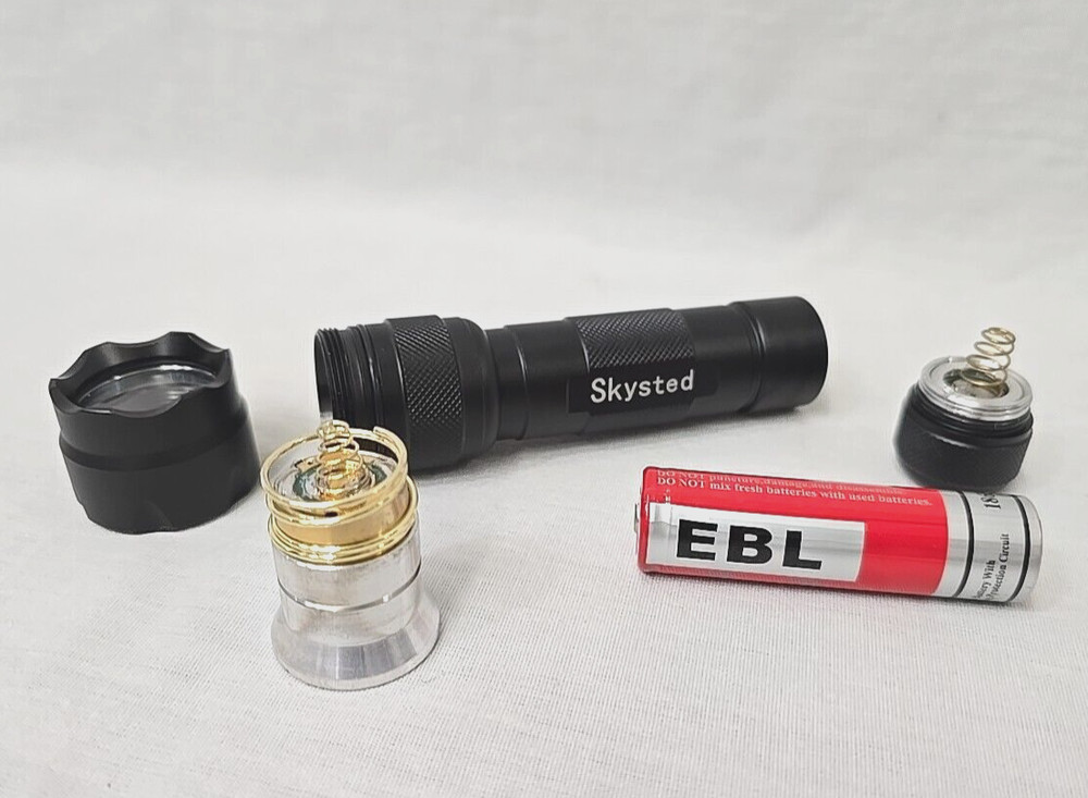 Skysted Single Mode Mini Portable Handheld Flashlight w/ Supfire Battery Charger