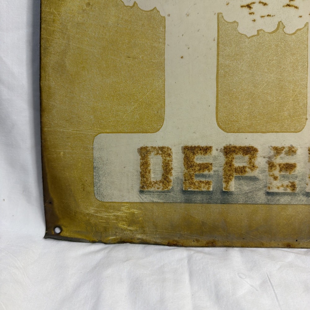 Woods Seeds Embossed Tin Sign