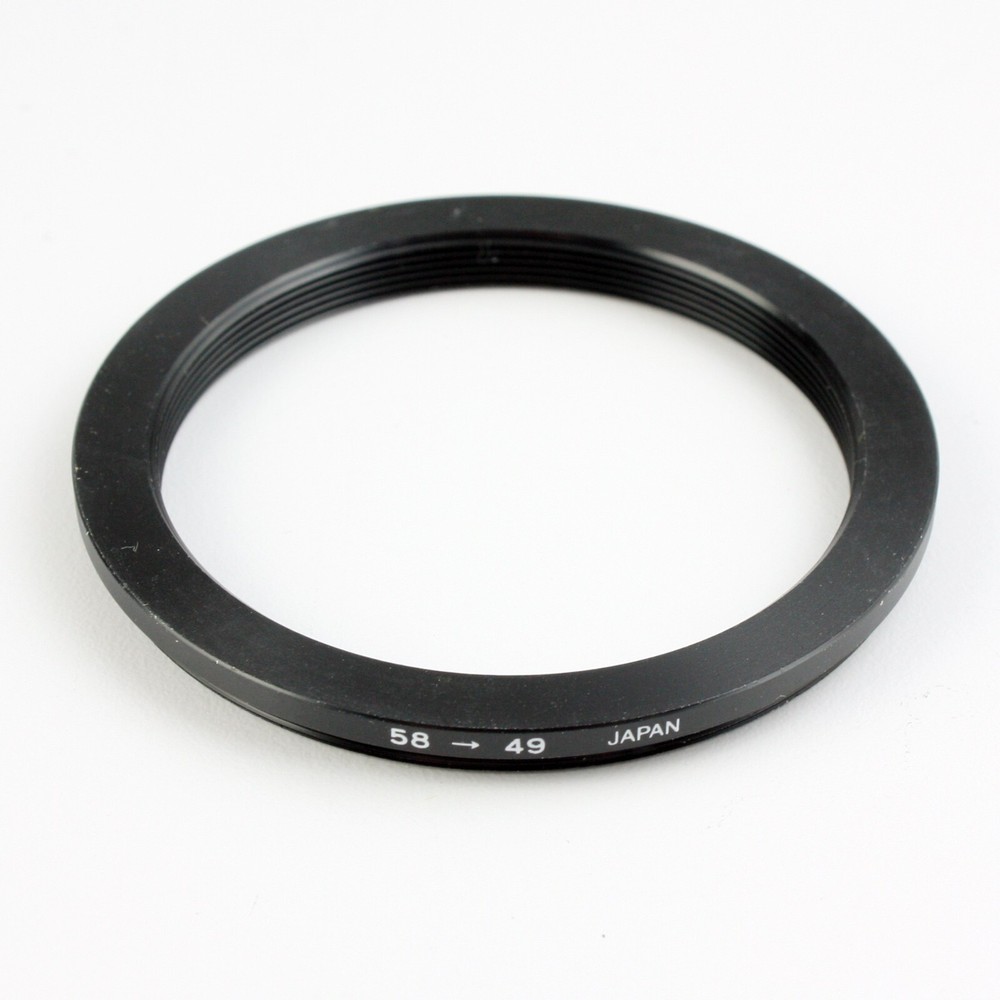 Unbranded 58-49mm Step-Down Adapter Ring New Old Stock