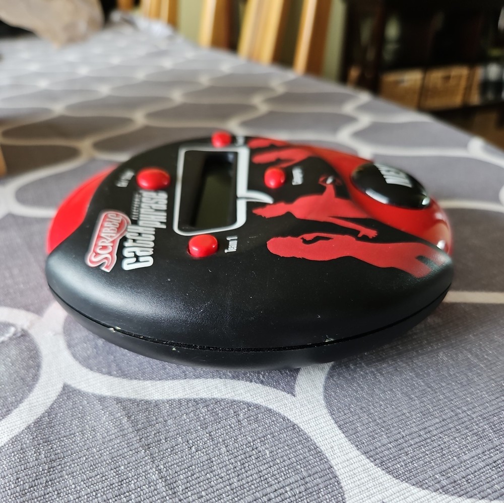 Hasbro Scrabble Electronic Catch Phrase Handheld Electronic Game