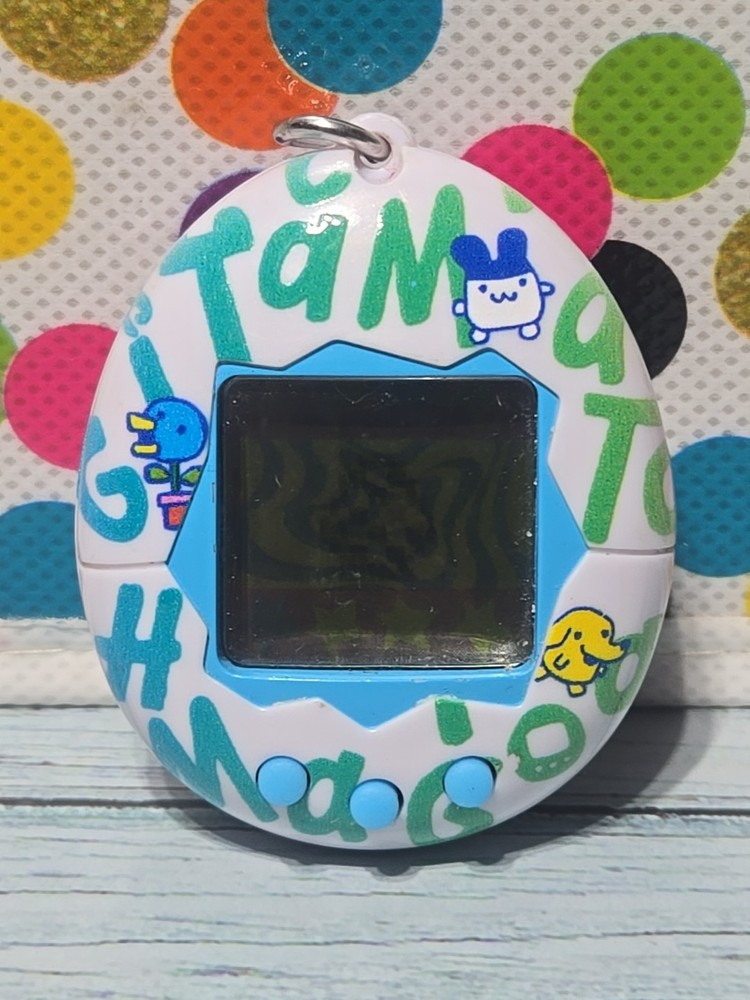 2017 Tamagotchi 20th Anniversary Celebration Edition Repeating Logo