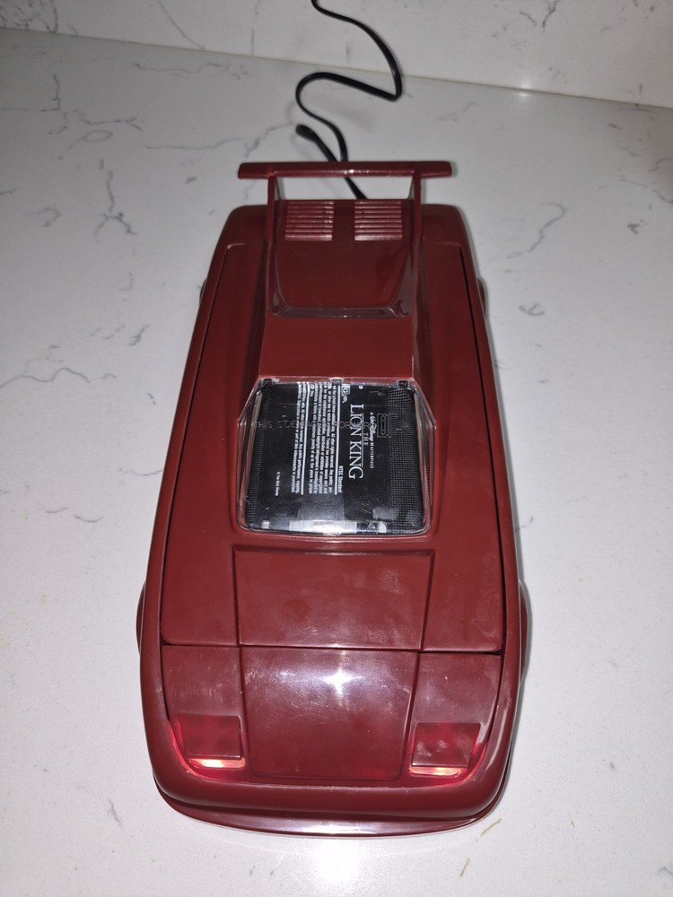 Vintage Red Car Cassette Rewinder. Electronics with Working Lights