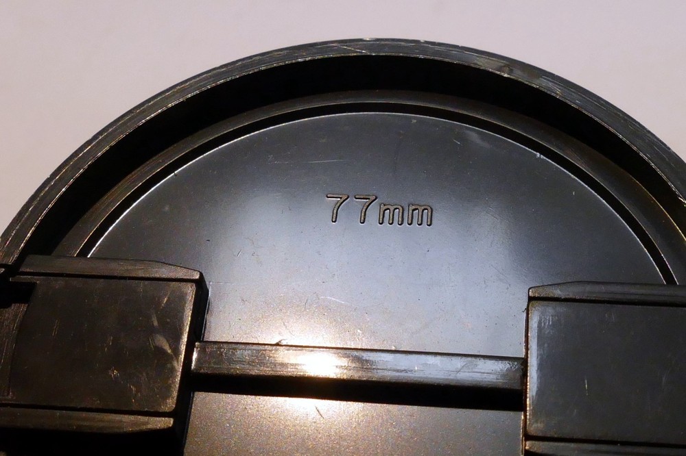 77mm lens front cap (snap on type) all black