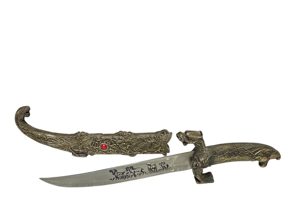 decorative dagger knife with red stone