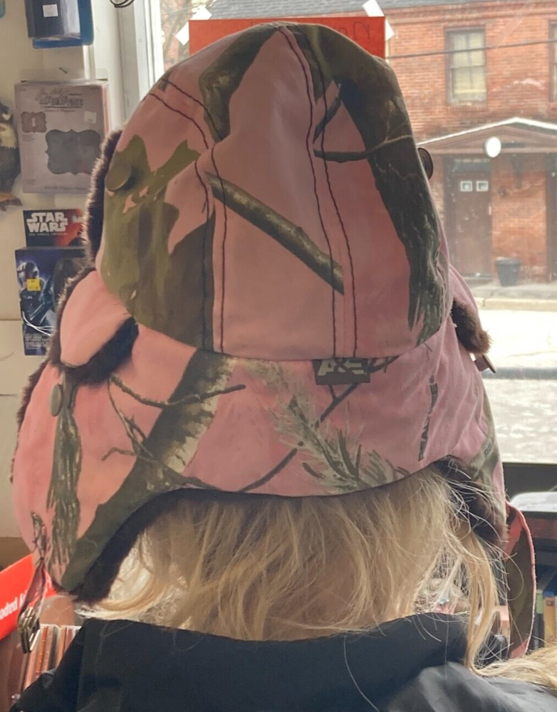 WOMENS A & E DUCK DYNASTY TRAPPER/AVIATOR STYLE HAT PINK CAMO