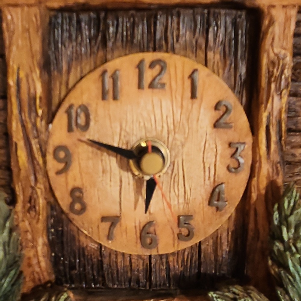 resin wall clock. works and has a chime.