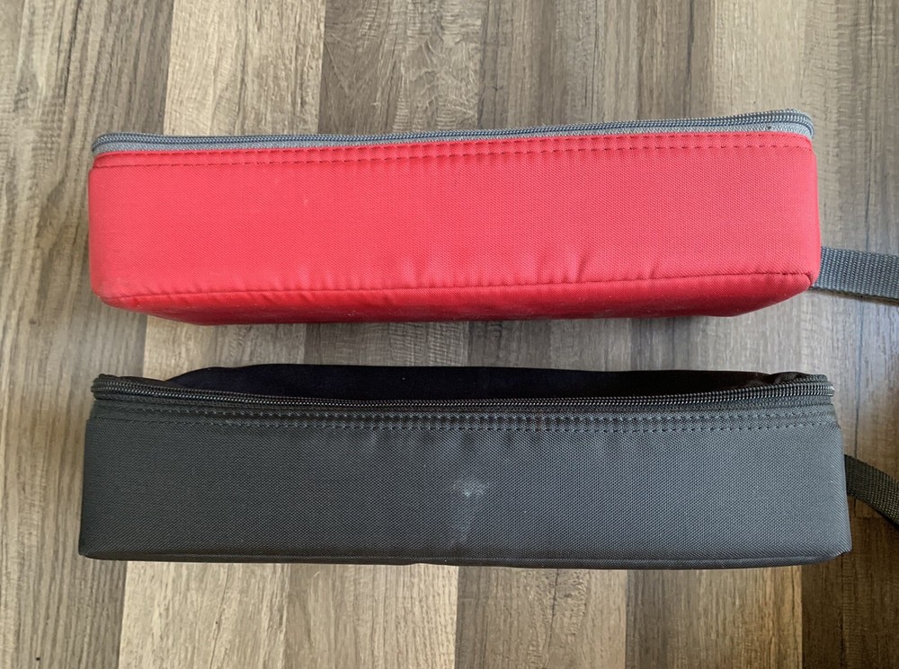 2- Case Logic 15-Cassette Cases (one Red, One Black)