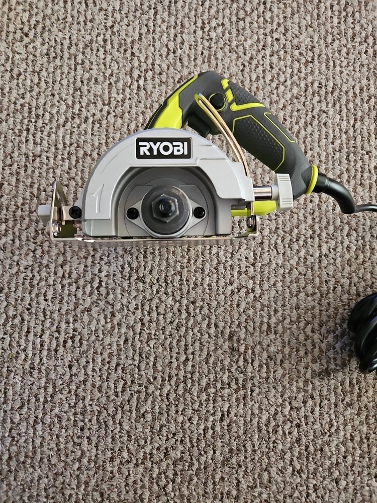 RYOBI TC401 "4" HAND HELD TILE SAW.