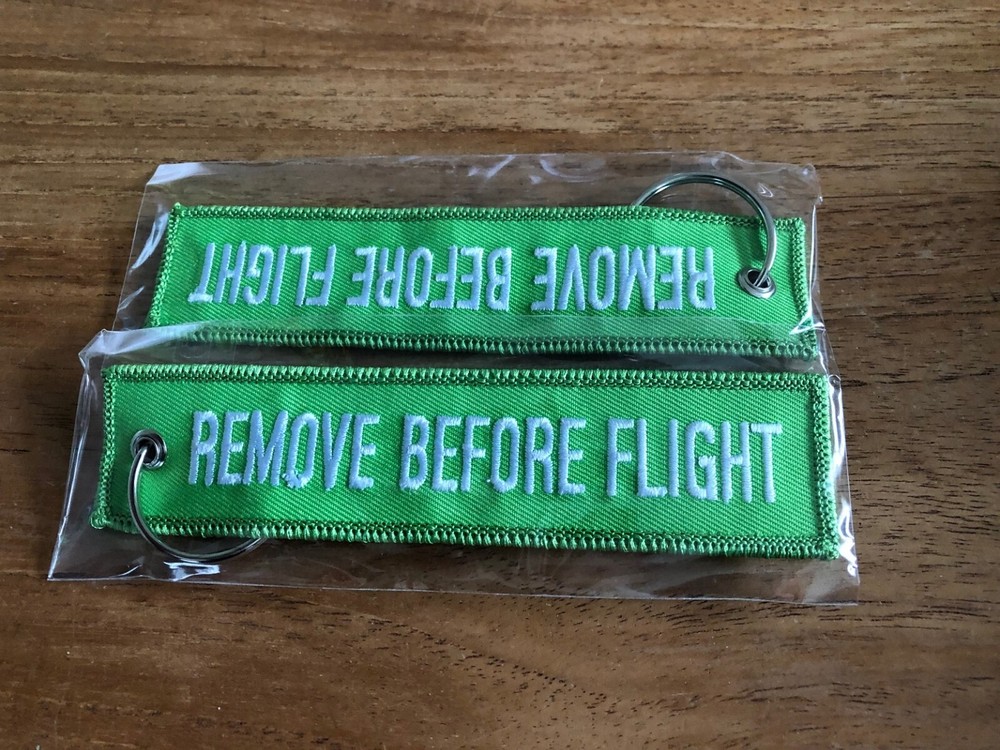 REMOVE BEFORE FLIGHT embroidered keychain Green color