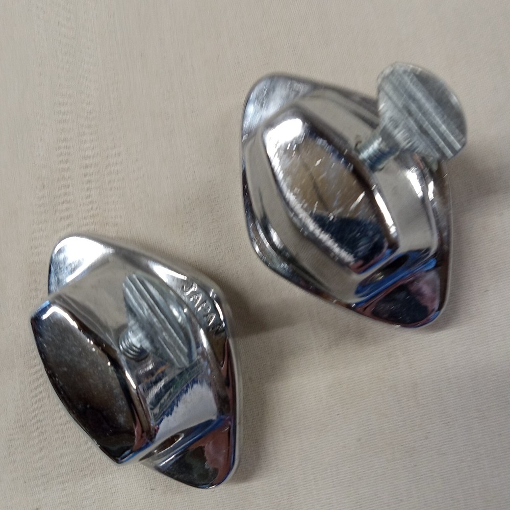 Two Asian Leg Mounts