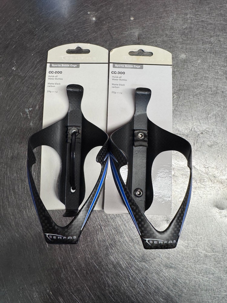2X CARBON serfas carbon bottle cage w/blue accent CC-300