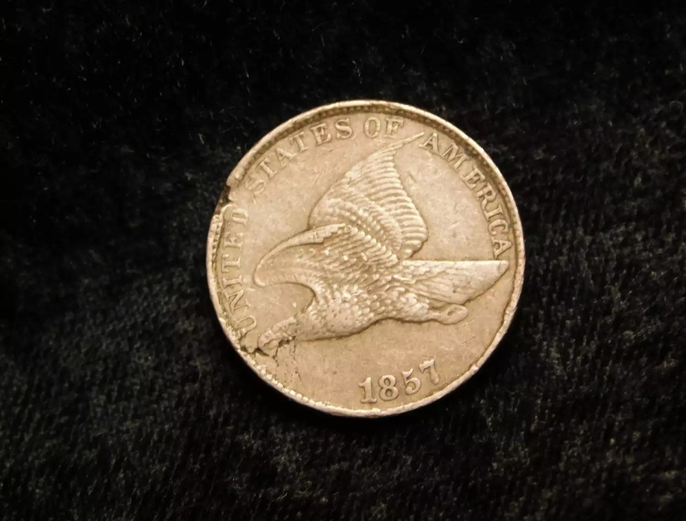 1857 Flying Eagle Cent w/ Ragged Clip & Lamination