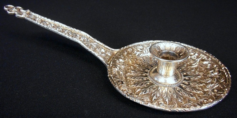 A rare repousse solid silver chamberstick, 11oz mark, S.Kirk & Son c.1886-96