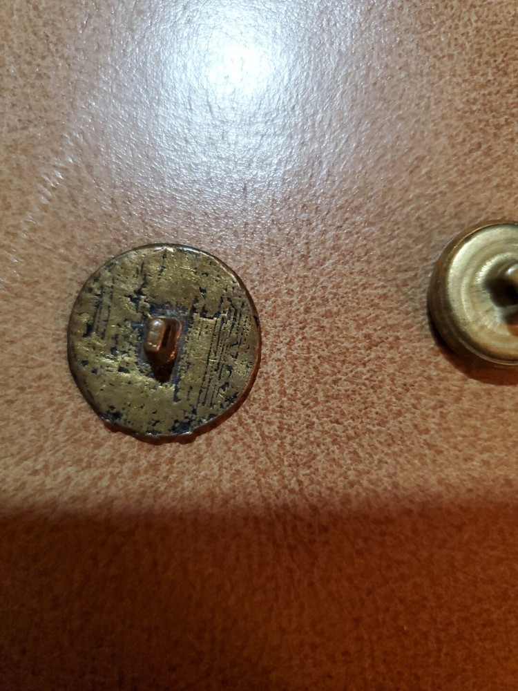 4 miscellaneous antique brass buttons