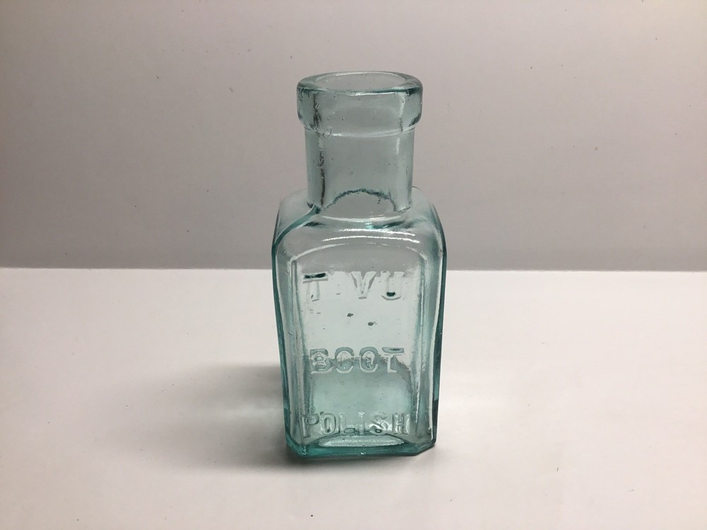Antique Tavu Boot Polish Bottle.
