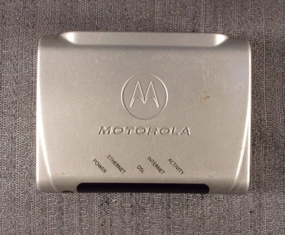 MOTOROLA SILVER E141744 INTERNET MODEM/ROUTER