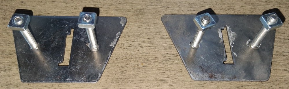 Two Gottlieb coin entry plates and hardware