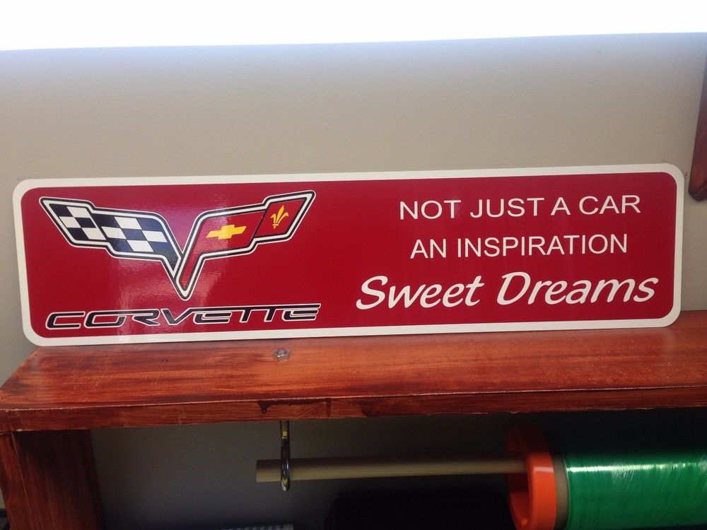 Red Corvette metal sign 6" x 24"