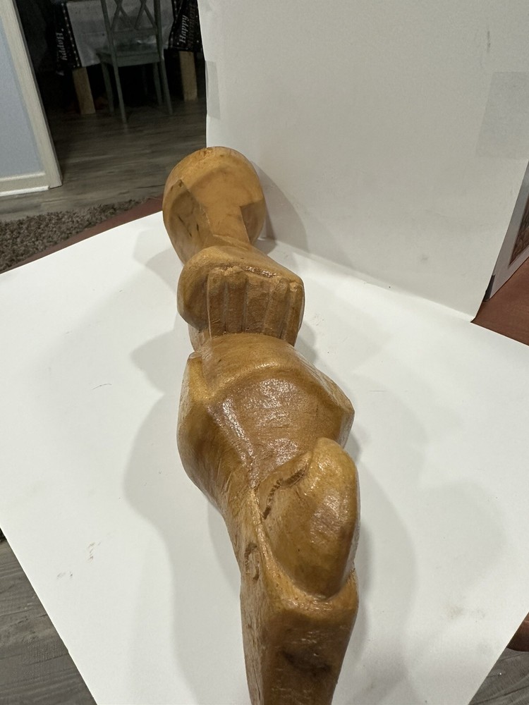 carved wooden parrot