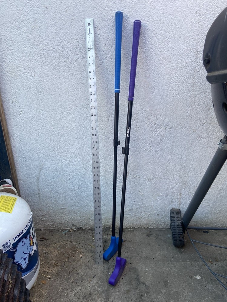 Two Nexgen iSpeed Golf Swing Trainers