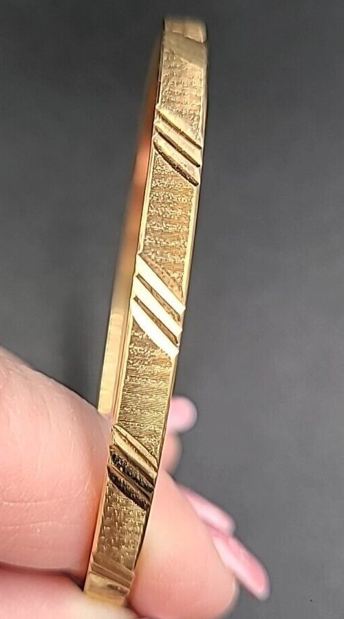 Monet Gold Tone Bangle Bracelet Etched Design Signed