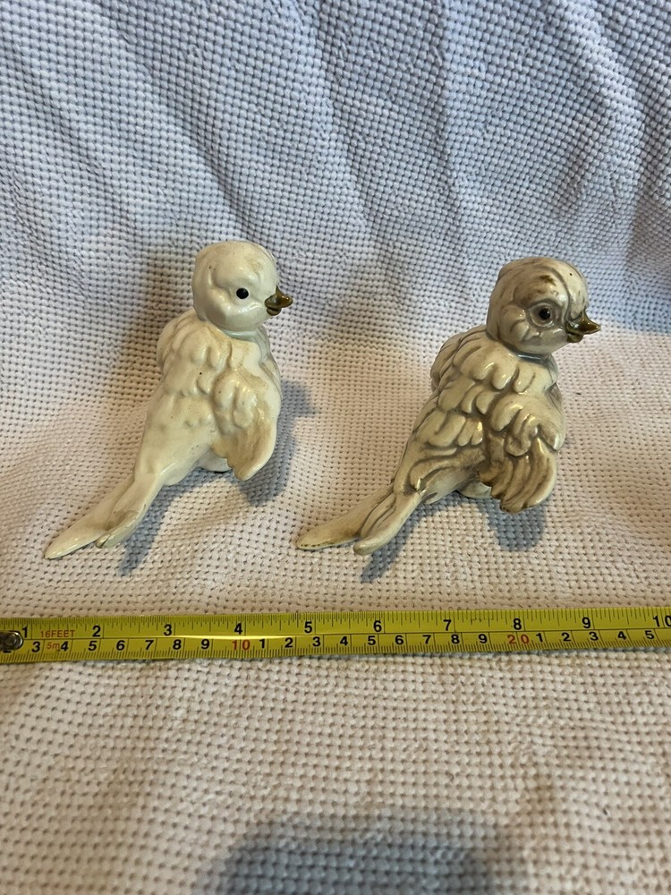 porcelain parrot figurines