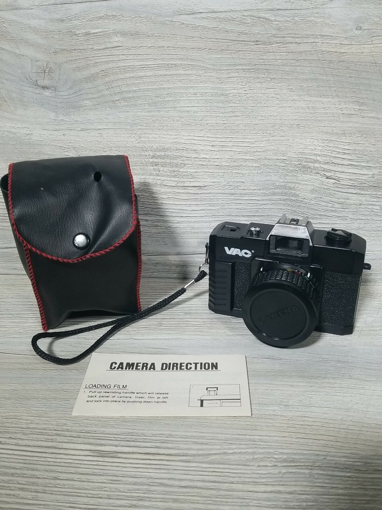 Vac 35MM Camera with Handstrap, Carrying Case, and Lens Cap