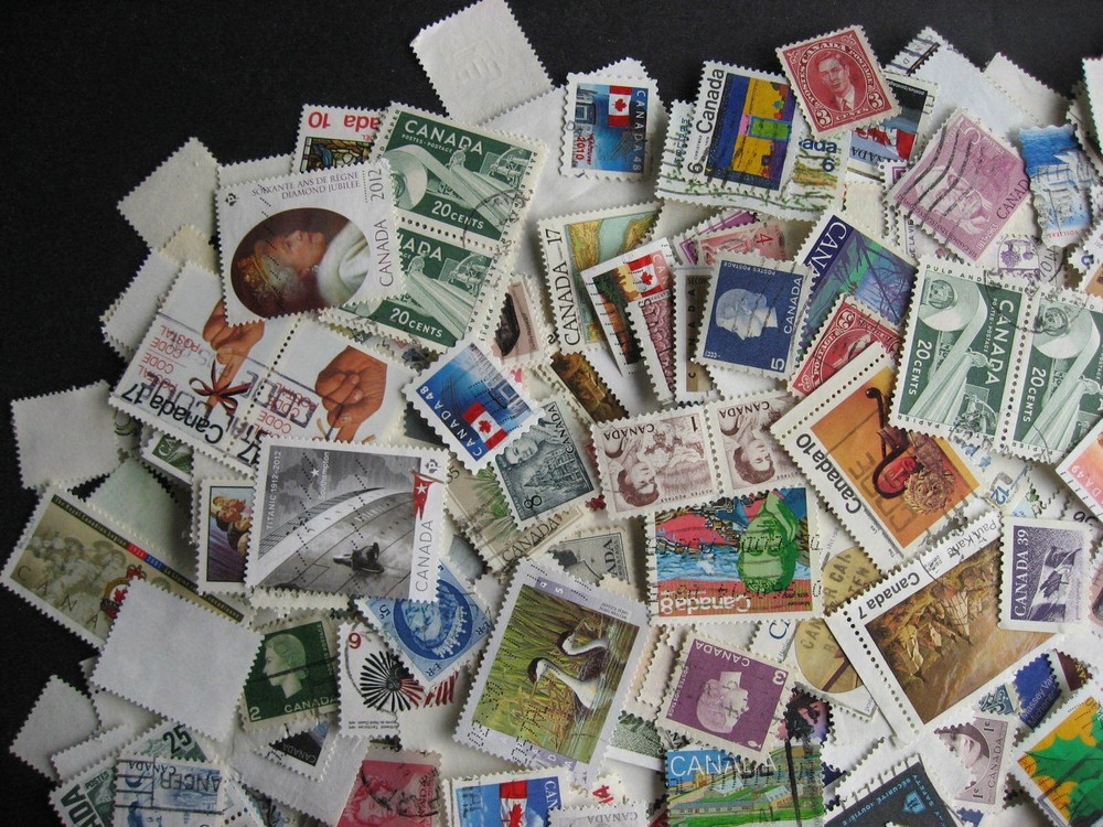 Canada colossal mixture (duplicates,mixed cond) 2000 laid out35%comems,65%defins