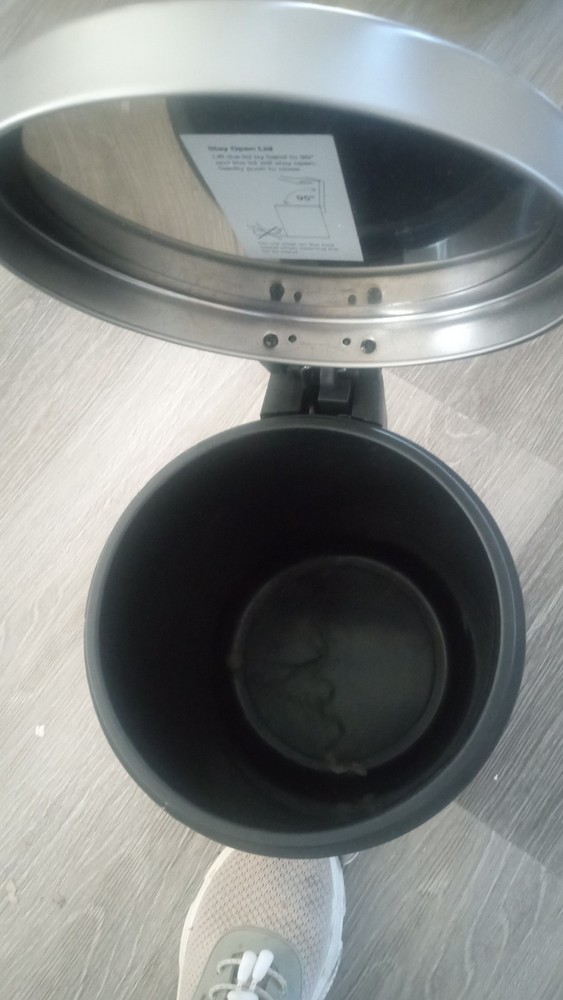 Small gray trash can