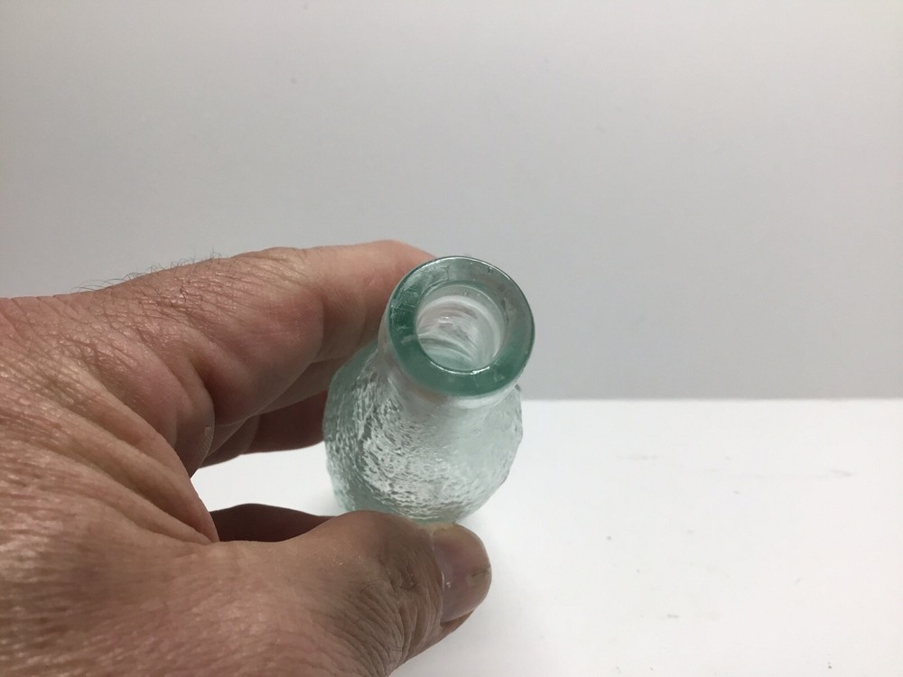 Small Antique Aqua Idris Fruit Juice Bottle.