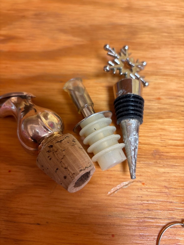 Wine charms and bottle openers