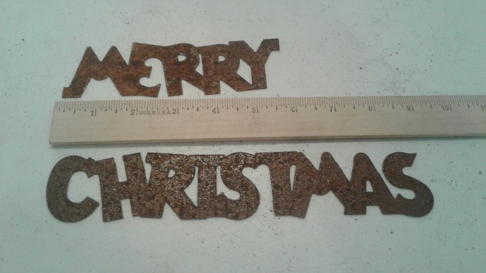 Rusty metal  "Merry Christmas"