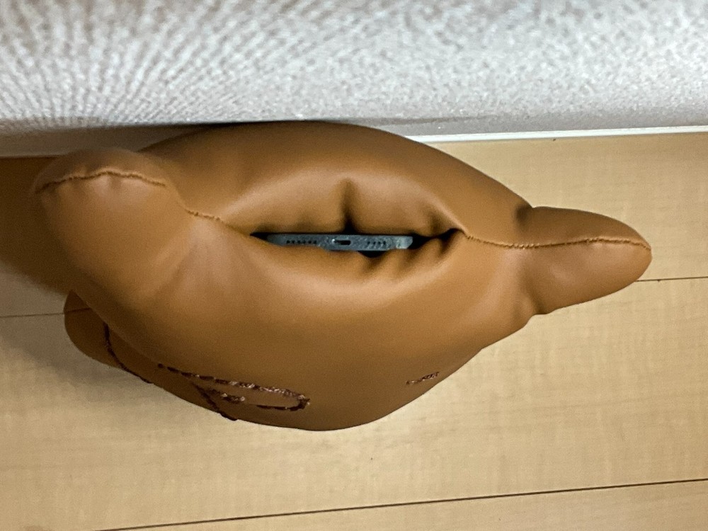 Handcrafted leather teddy bear that can chat in several languages