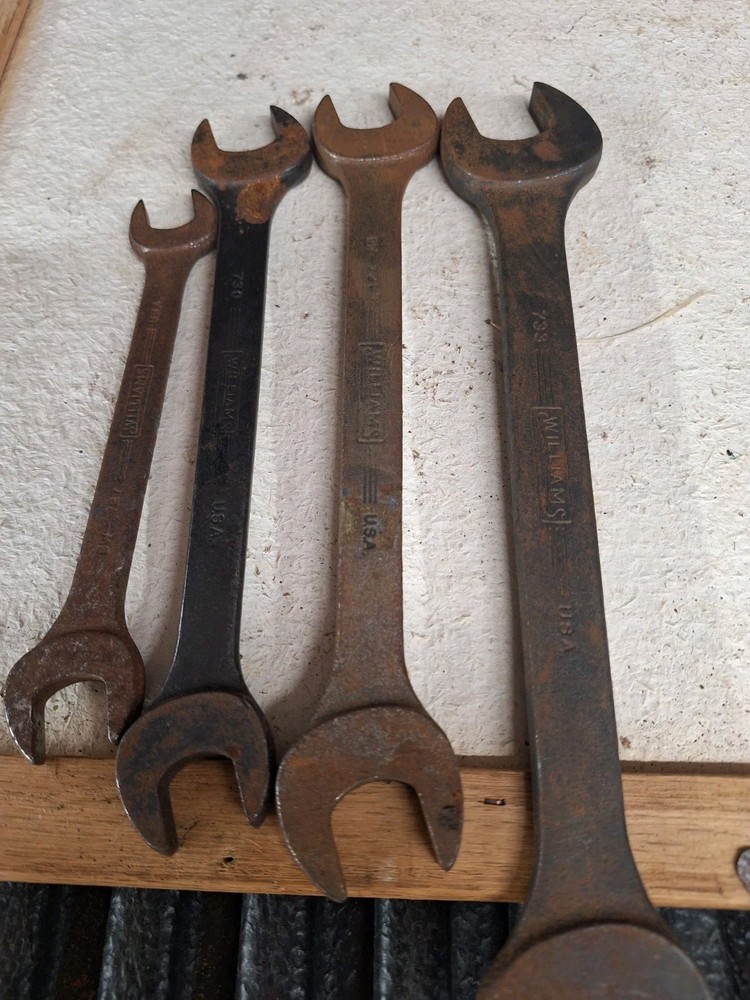 Vintage Williams metal toolbox with multiple Wrenches used
