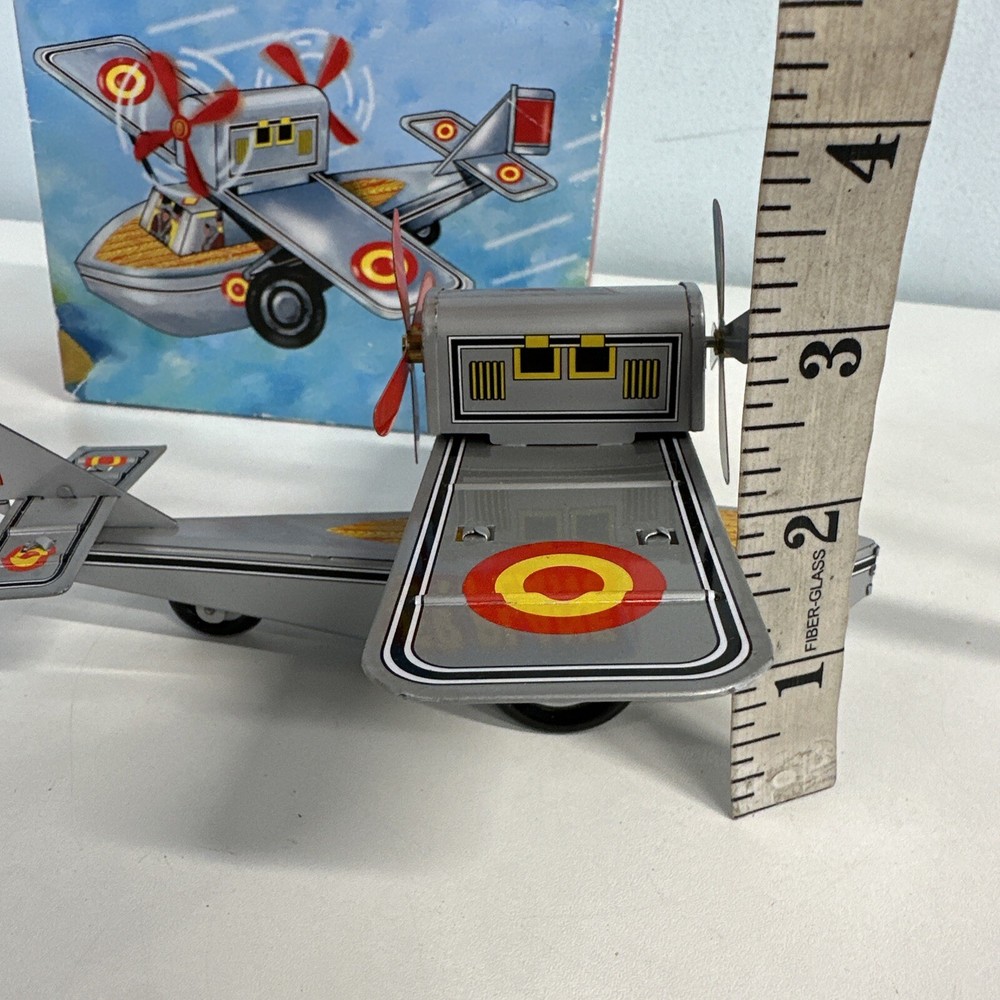 Supt Propeller Plane (We could not get this to work) Small Tin plane