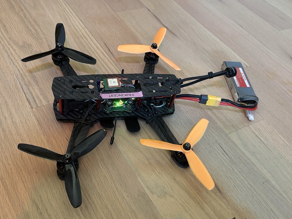 Fpv Drone With Lipo Battery And Extra Propellers Working