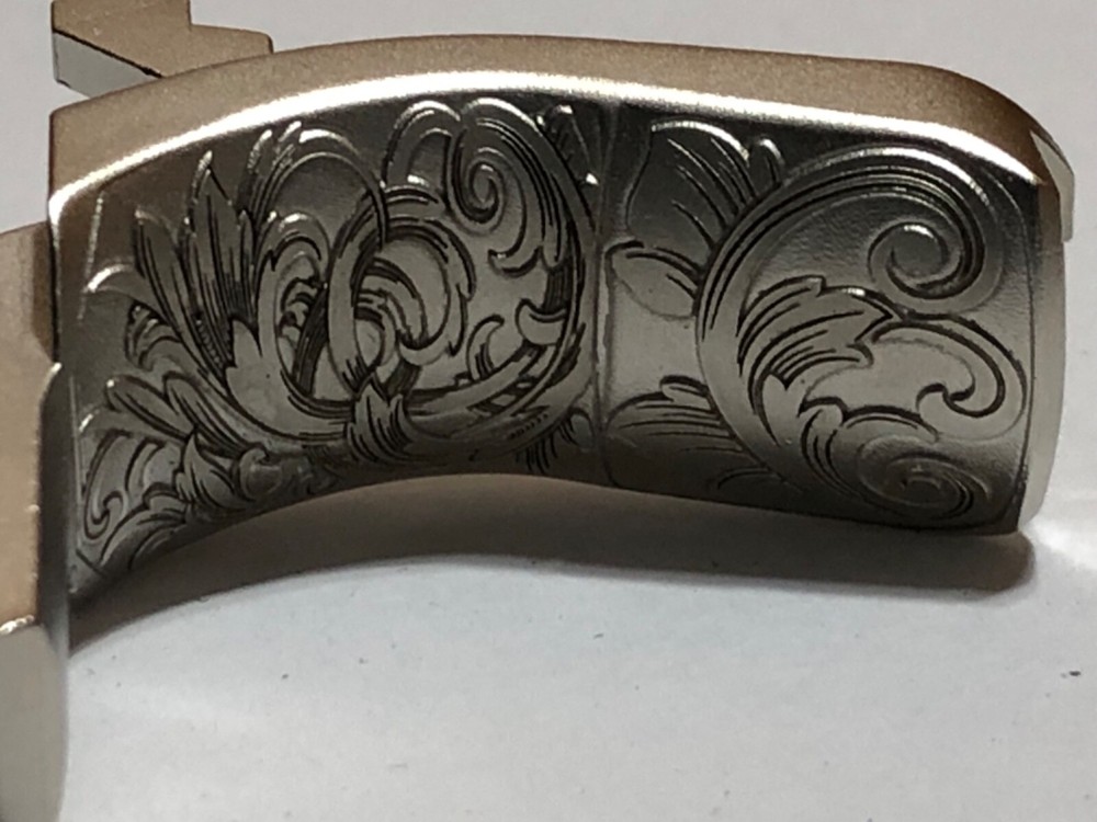 1911 GI Style Grip Safety - NEW satin nickel deep laser engraved scroll pattern