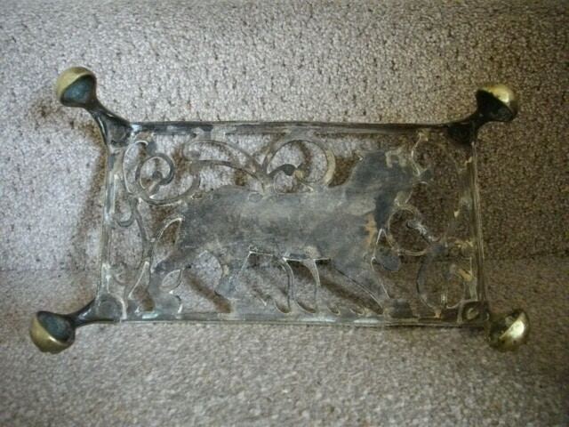 Brass trivet stand with strolling Tiger c1880