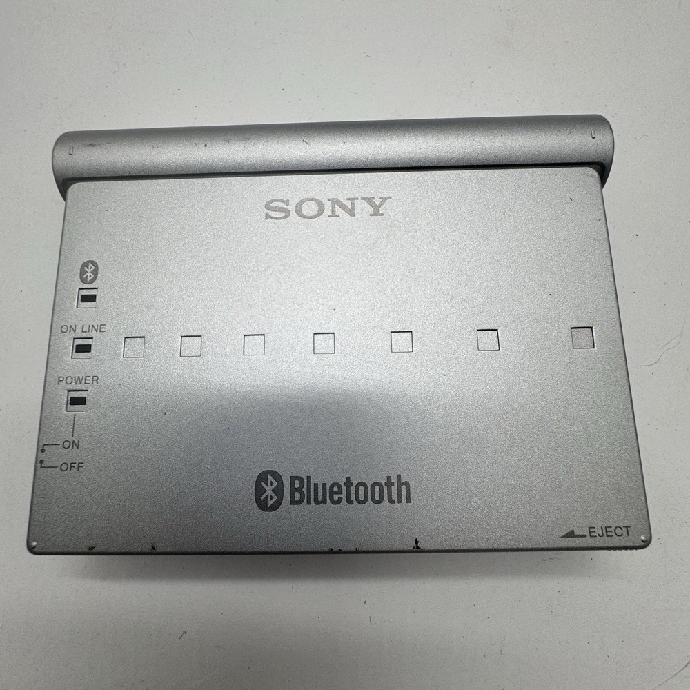 Sony BTA-NW1 Silver Bluetooth Function Modem Adapter w/ MDM-5614G PC Card Modem