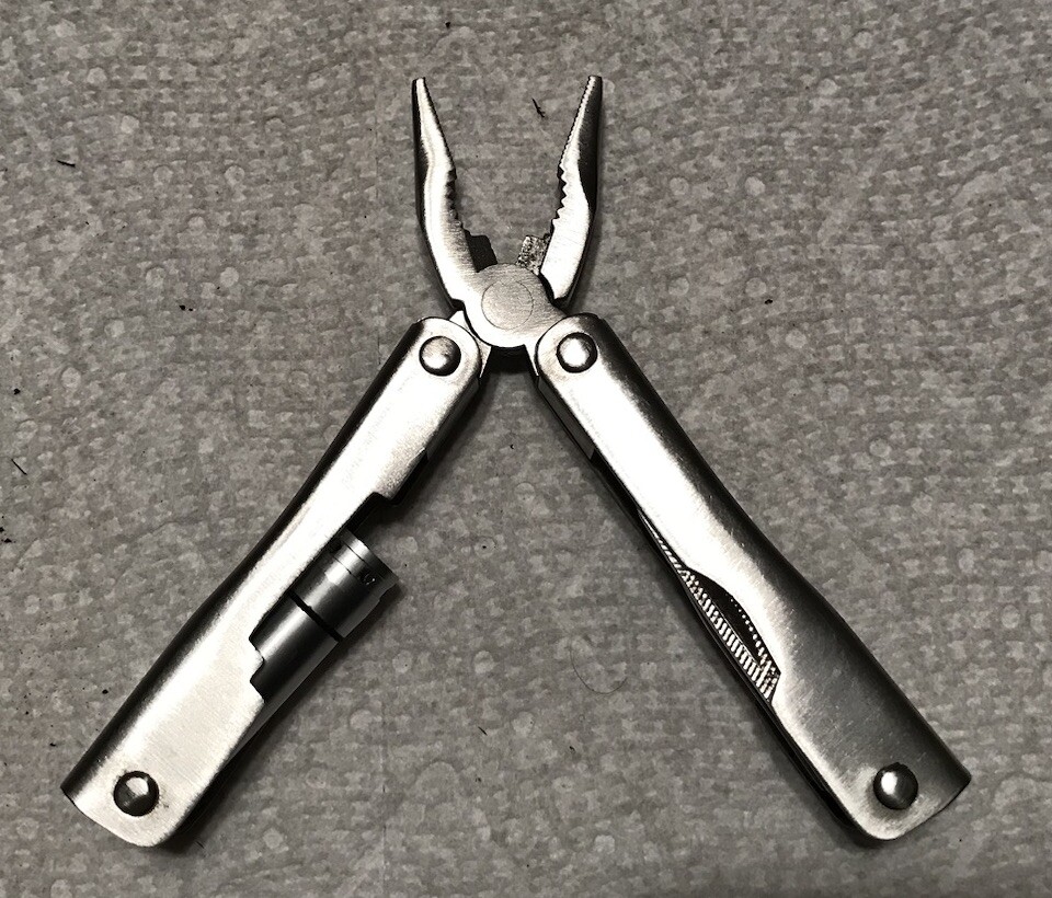 Unbranded Multi-tool, Pliers,saw knife & Battery Powered Light