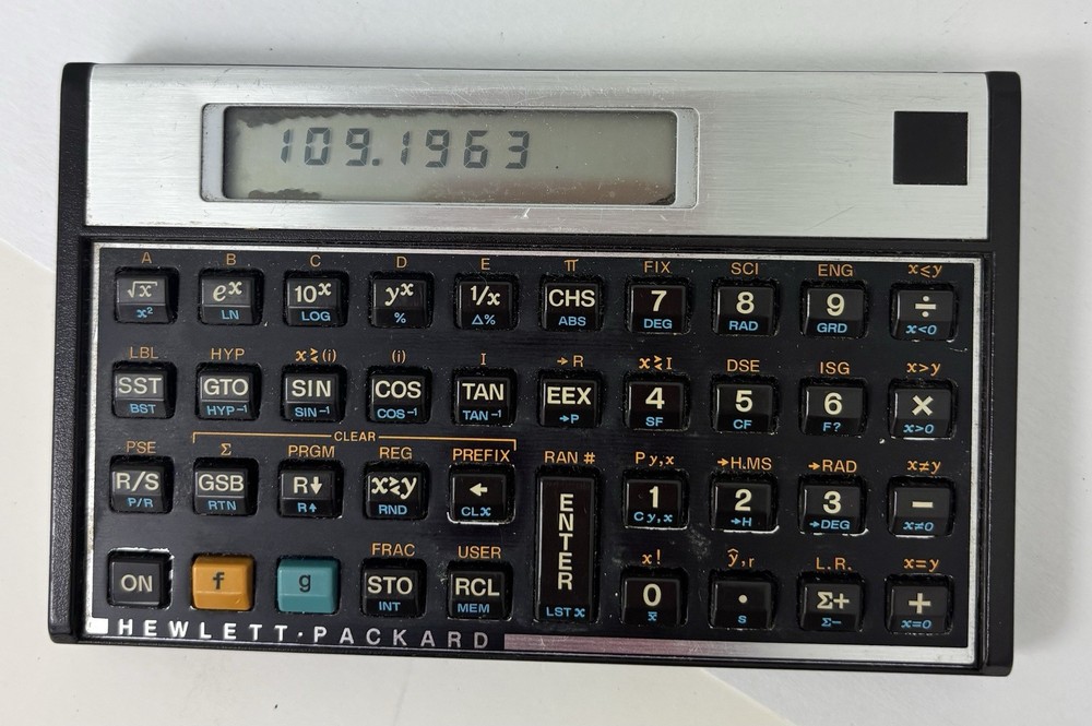 Hewlett Packard HP 11C scientific calculator with protective case Please Read