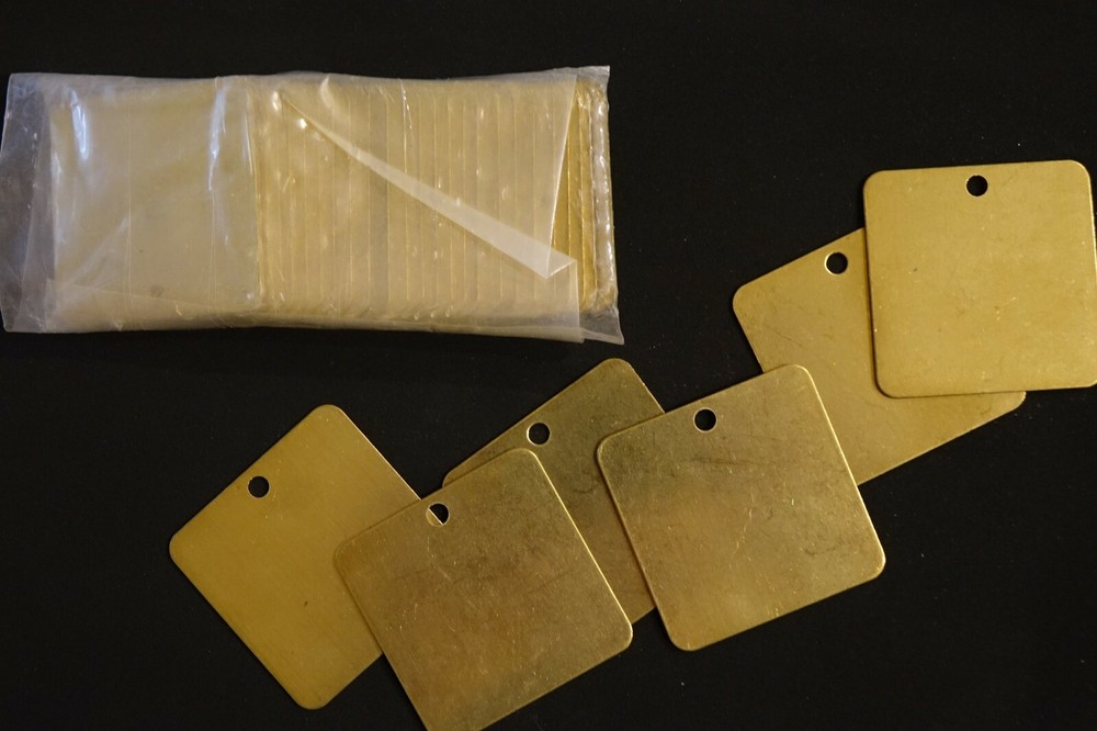 Brass tags 2 inches,new.25 pieces.