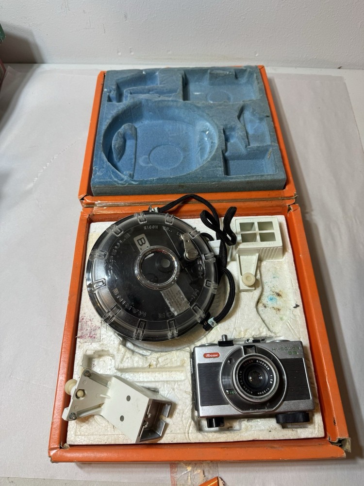 Ricoh 35 with underwater housing  package