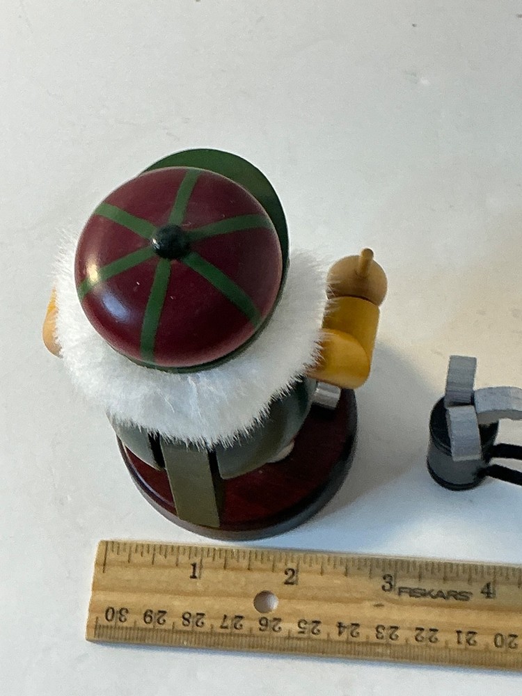 Wooden Nutcracker golfer with clubs 5 1/2”